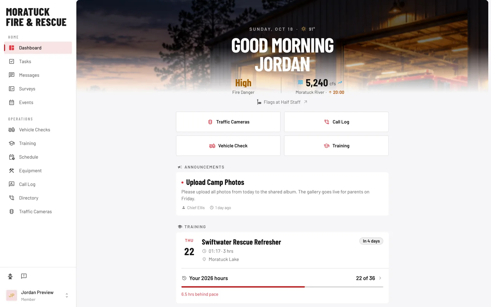 Web app dashboard with a sidebar of department tools, fire danger, river flow, quick actions, announcements, and annual training hours